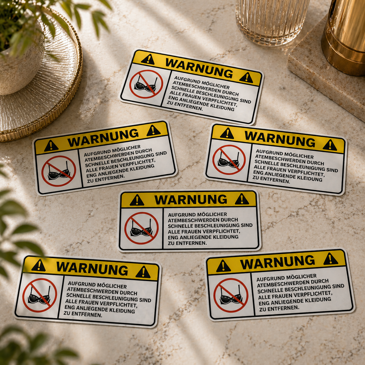 STICKER WARNING – Remove tight clothing DE
