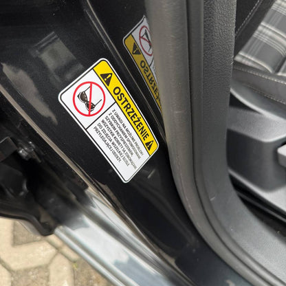 WARNING sticker – Remove tight clothing